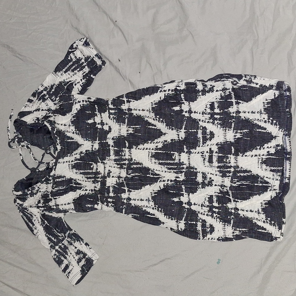 "Size M dress, white and faded blue."